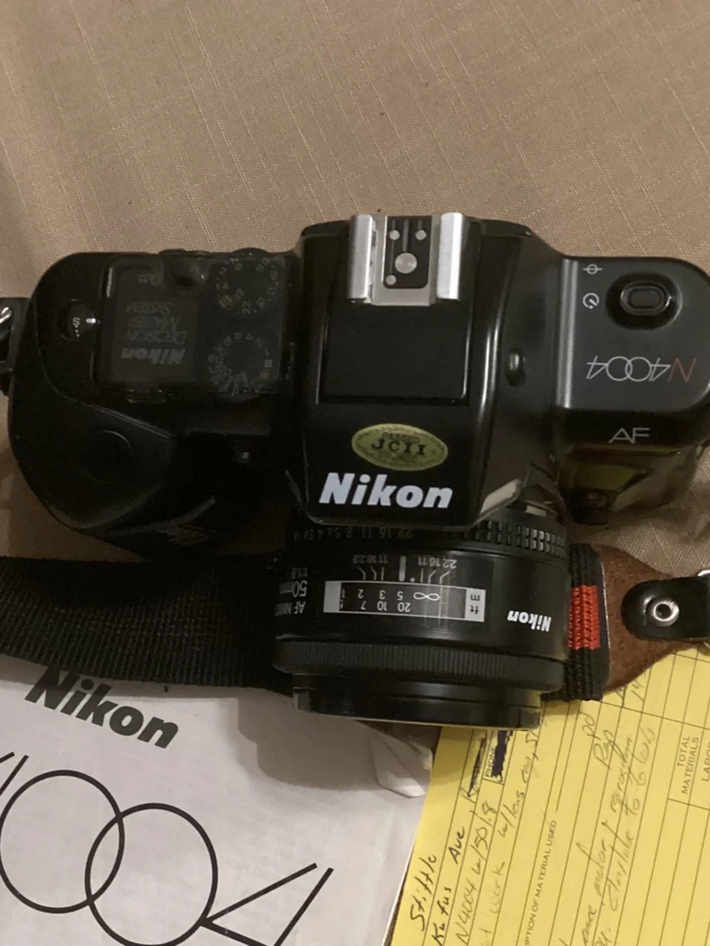 EUC Nikon N4004 AF 35mm Film Camera with Black Body and Red-Trim Bag